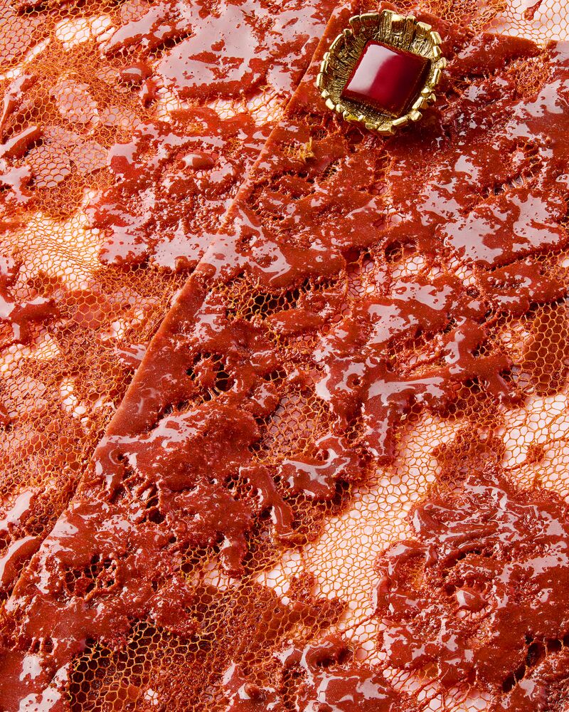 short jacket in silicone-coated lace