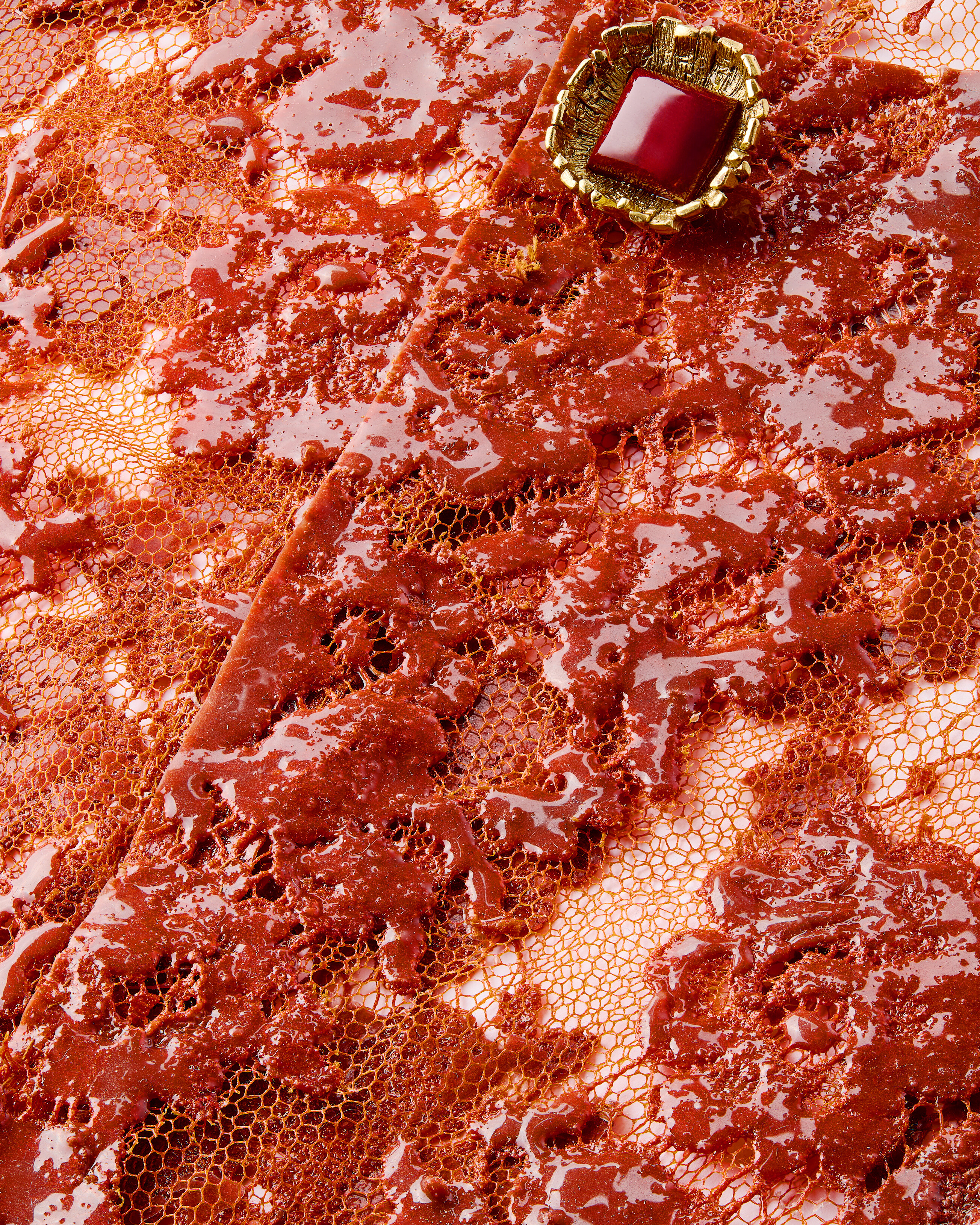 short jacket in silicone-coated lace