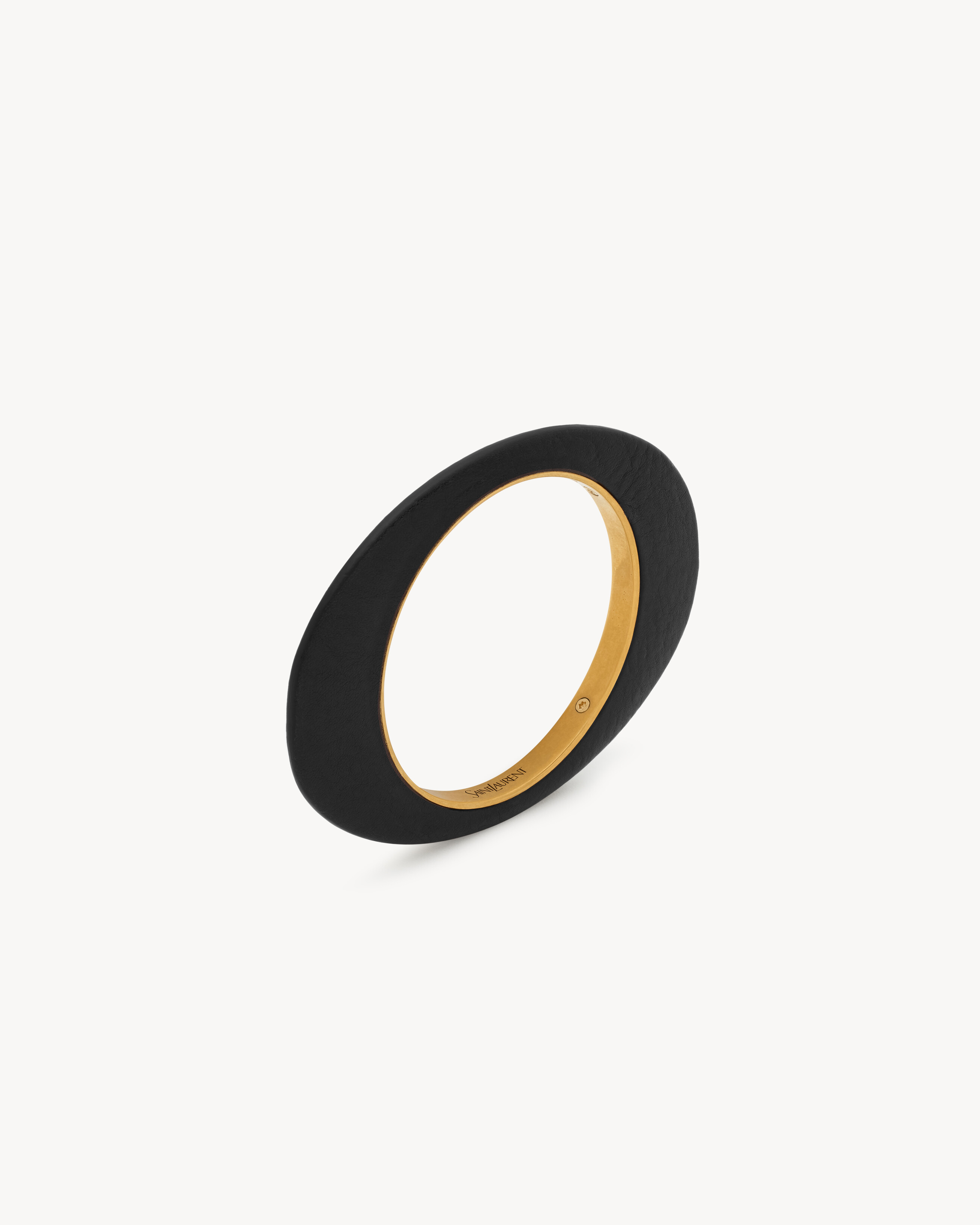 blade bangle in leather and metal