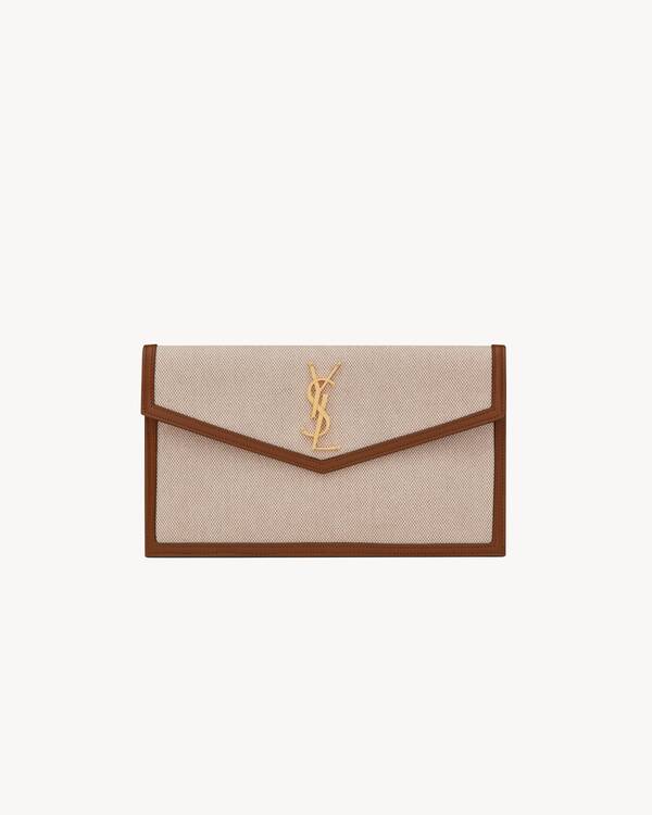 Yves Saint Laurent クラッチバッグ ベージュ レディース UPTOWN pouch in canvas and smooth leather in Beige | Saint Laurent