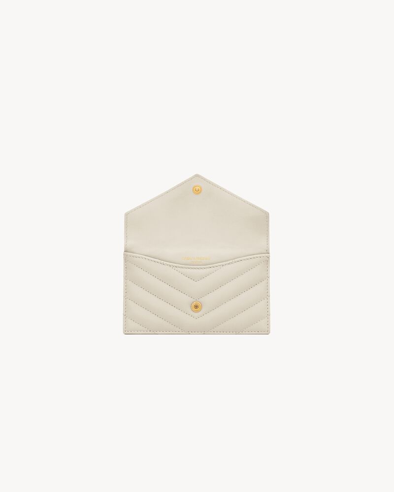 CASSANDRE MATELASSÉ FRAGMENTS FLAP CARD CASE IN LAMBSKIN