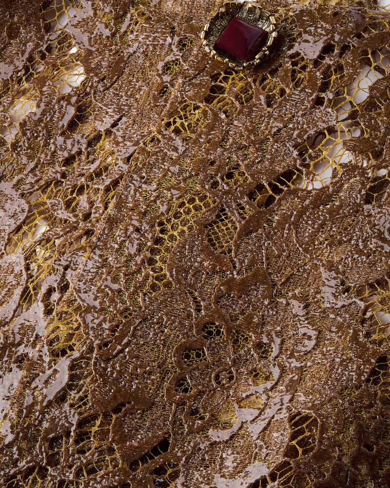 short jacket in silicone-coated lace
