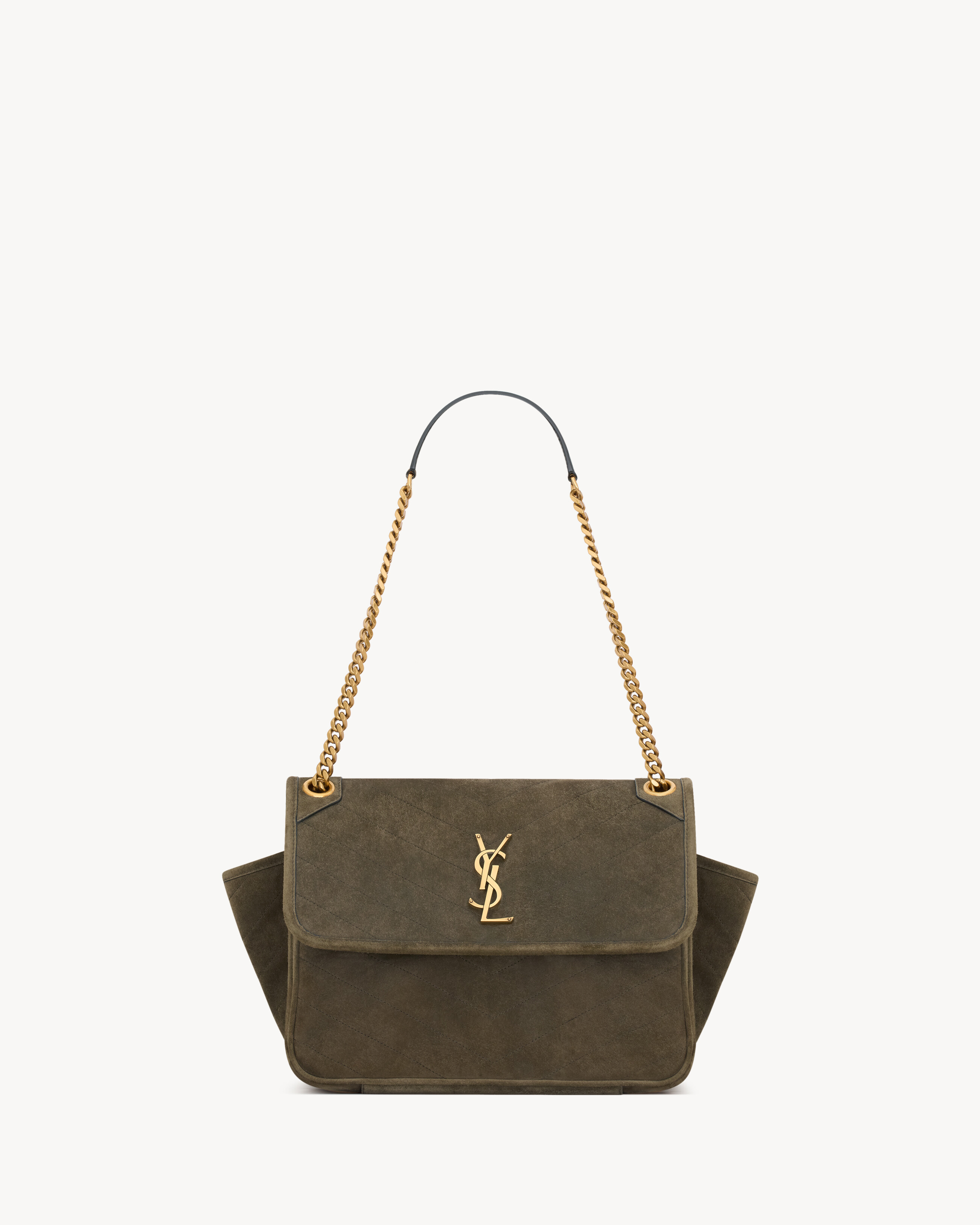 NIKI TRIPOUCH en suède