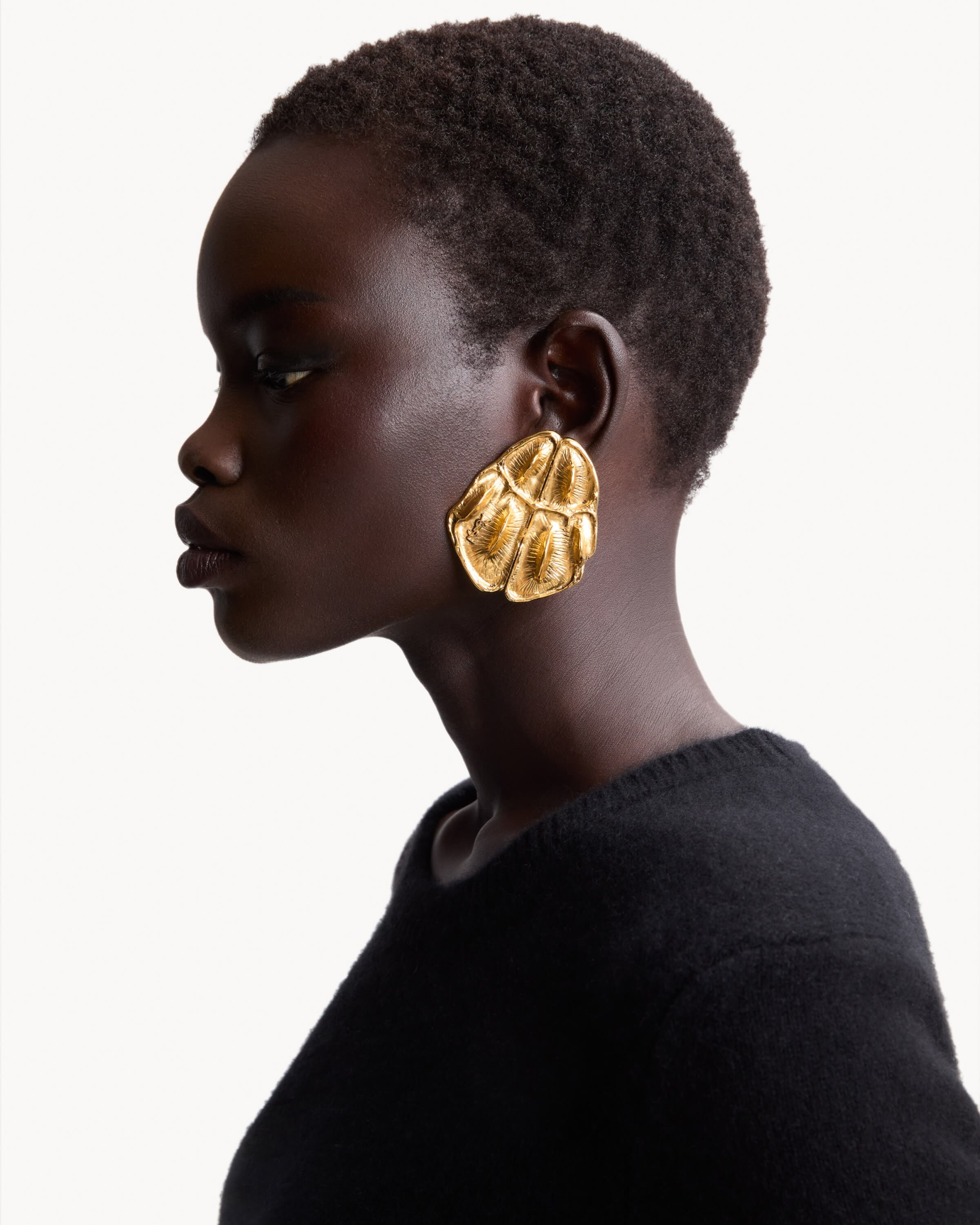 CASSANDRE crocodile earrings in metal
