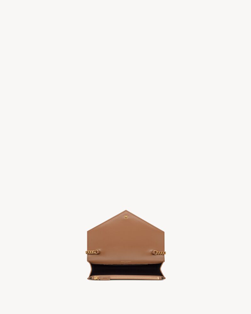 CASSANDRE envelope chain wallet in patent leather
