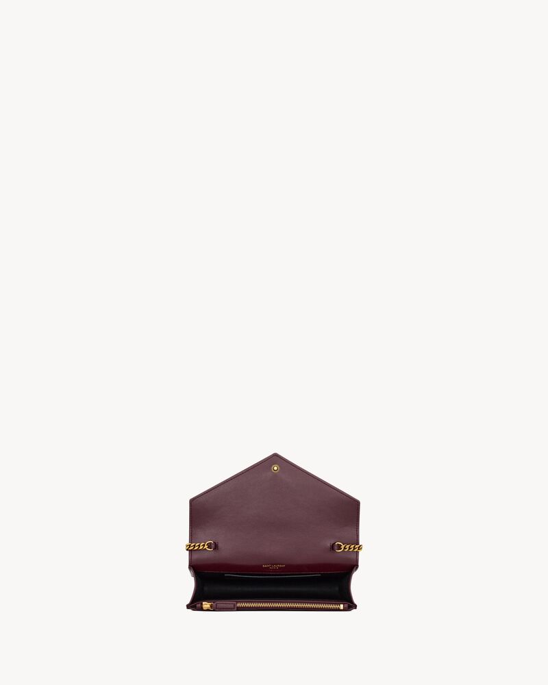 CASSANDRE envelope chain wallet in GRAIN DE POUDRE leather in