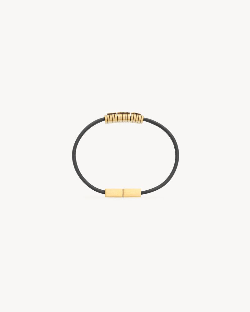 CASSANDRE cord bracelet in leather and metal