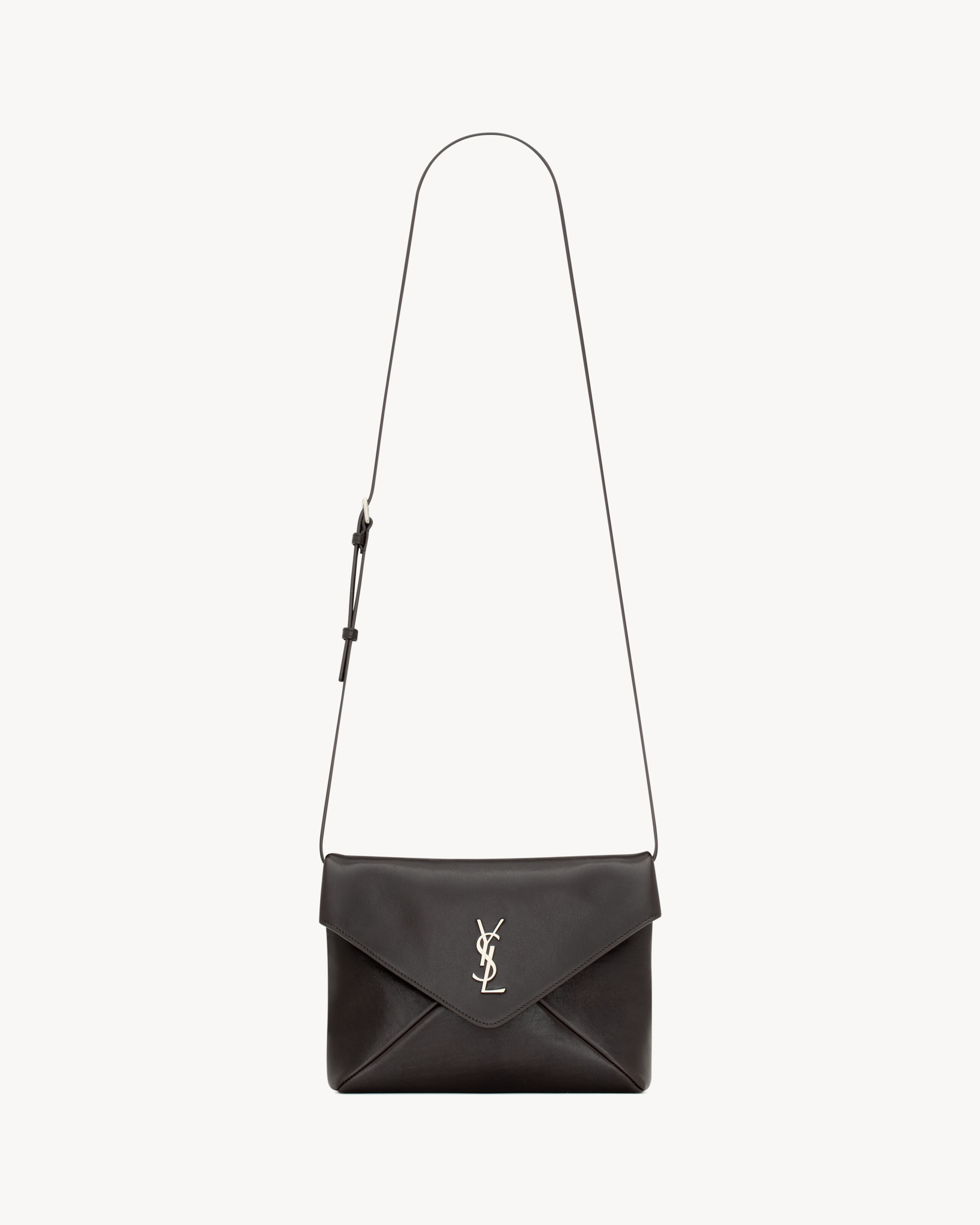 CASSANDRE envelope messenger in leather