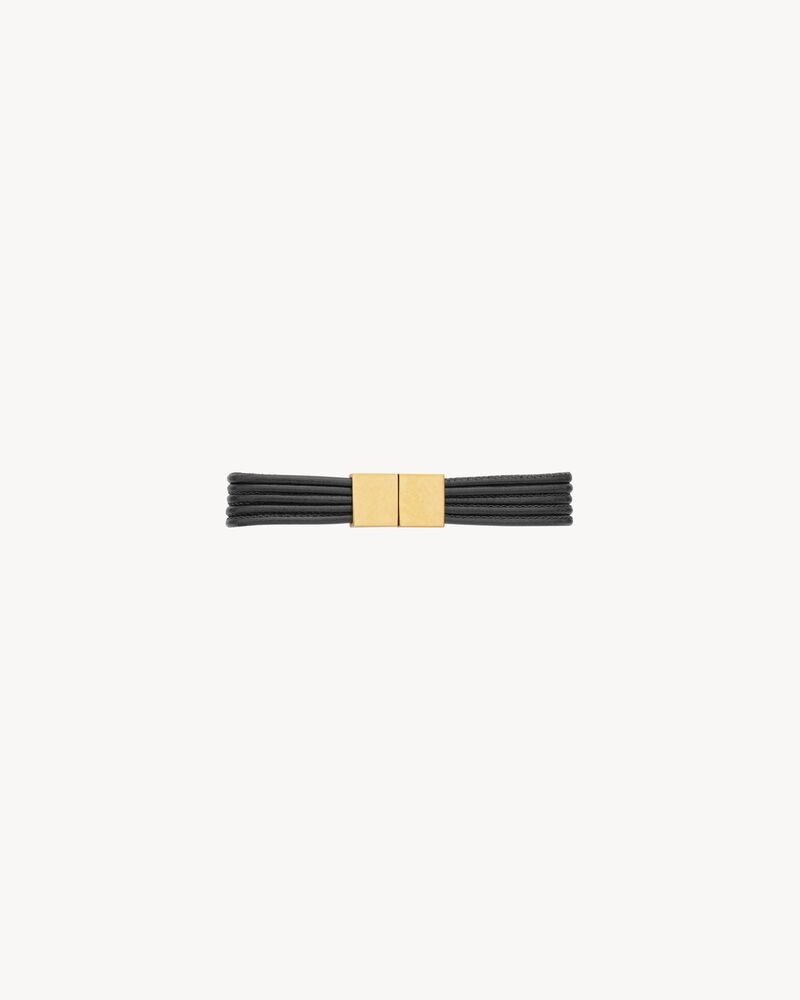CASSANDRE cord bracelet in leather and metal