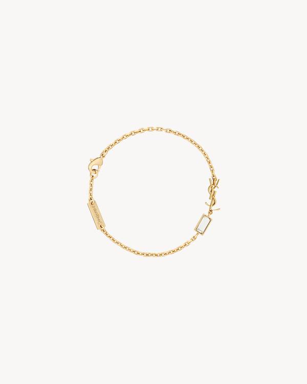 Horizontal Chain Fall CASSANDRE charm bracelet in metal and rhinestone in Gold | Saint ...
