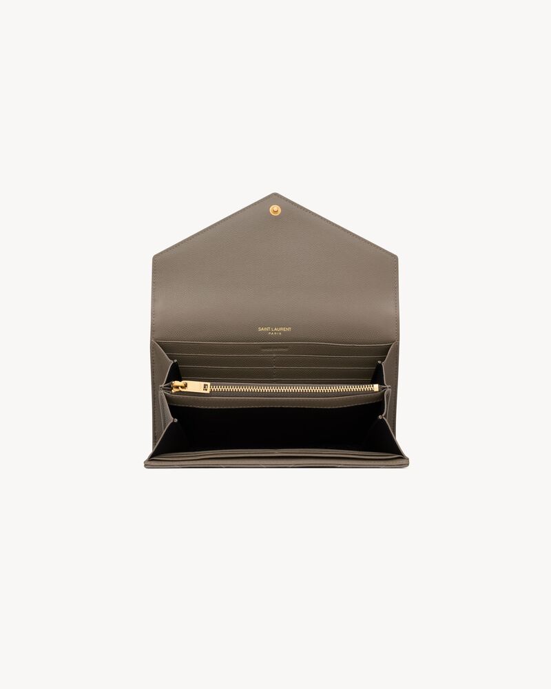 CASSANDRE large flap wallet in GRAIN DE POUDRE leather
