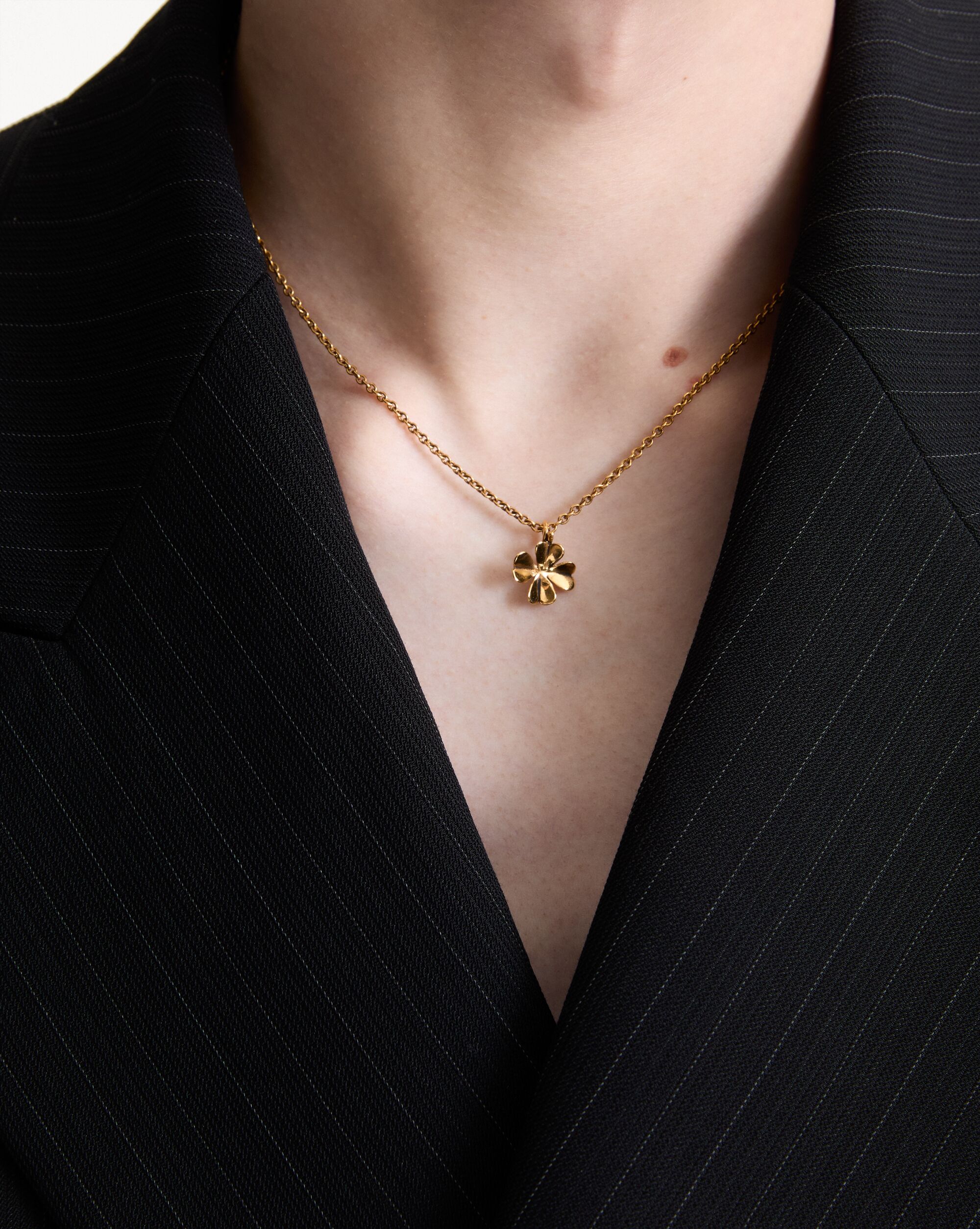 clover necklace in metal