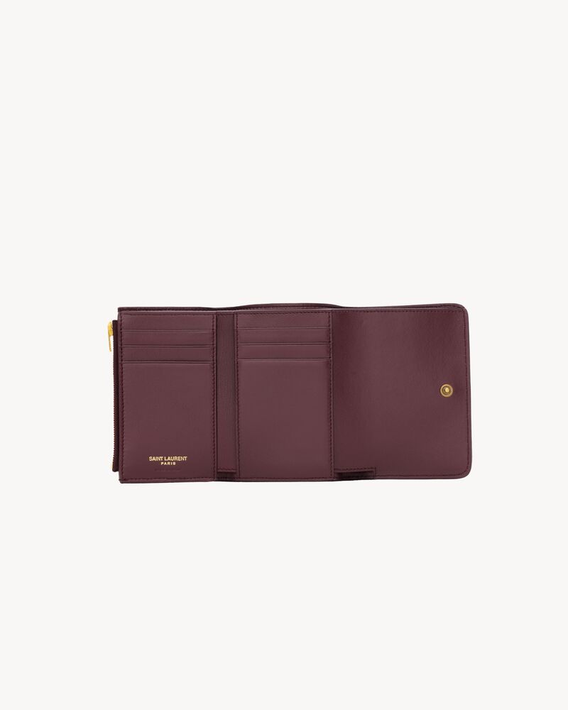 NIKI slim tri-fold wallet in vintage leather