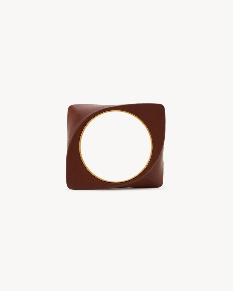 twisted blade bangle in leather and metal