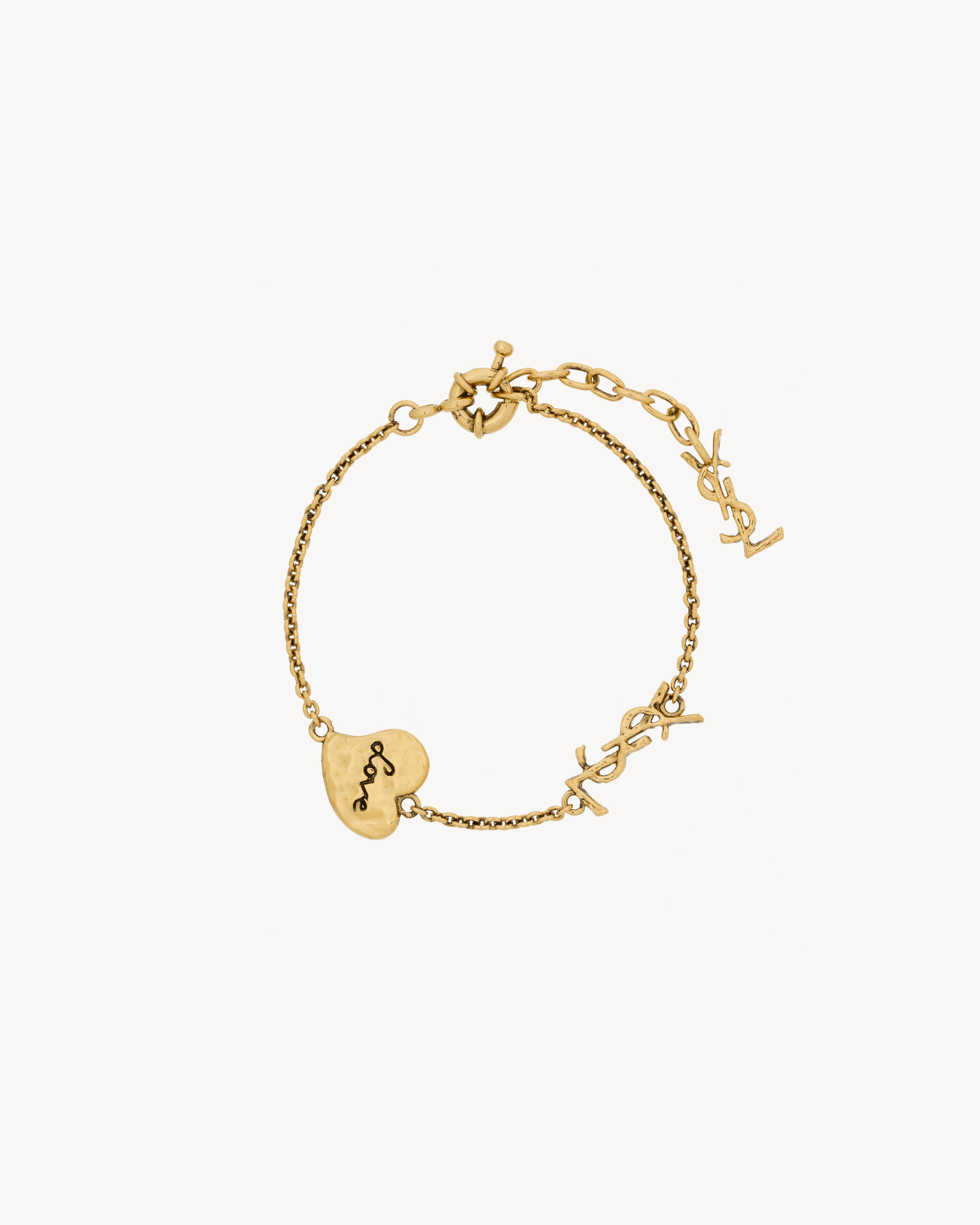 YSL   Women's Patinated Gold Cassandre Heart Bracelet In Brass - Yellow/Gold - L