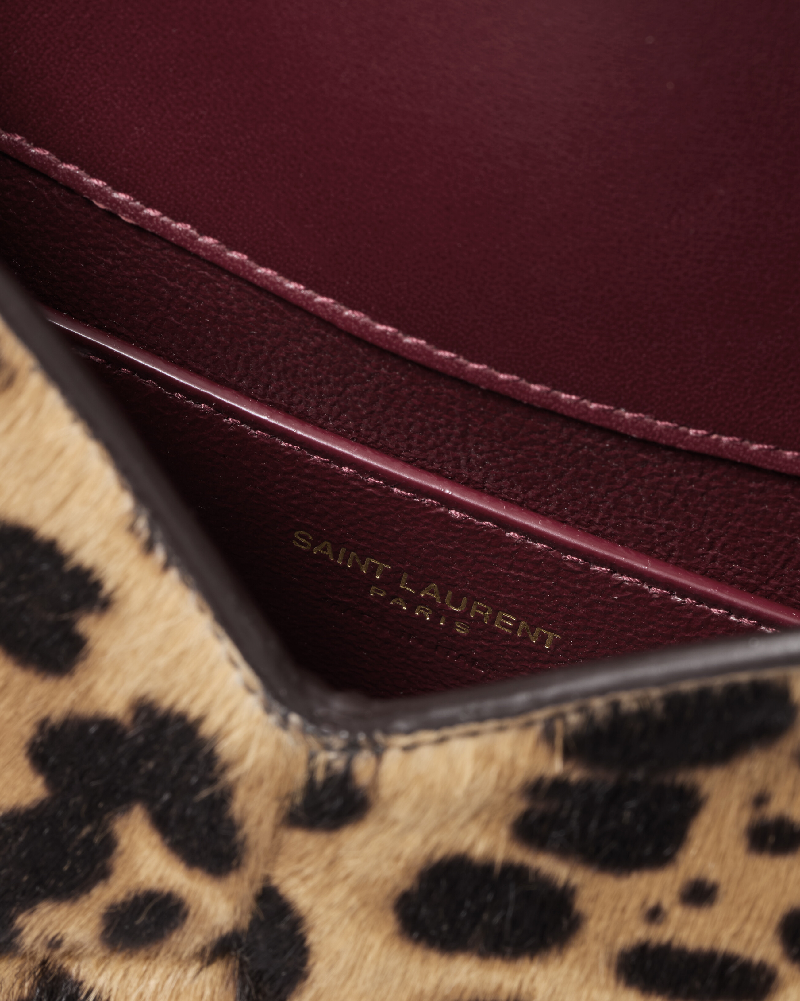 CASSANDRE small chain pouch in pony hair leather