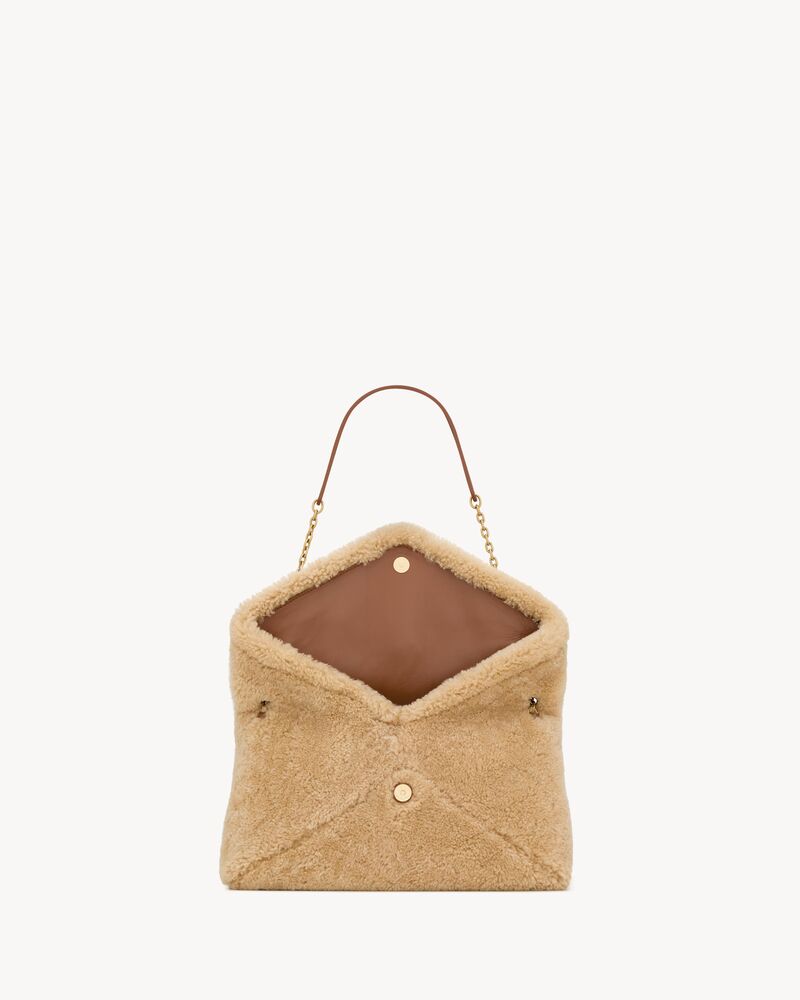 CASSANDRE large pouch on chain in shearling