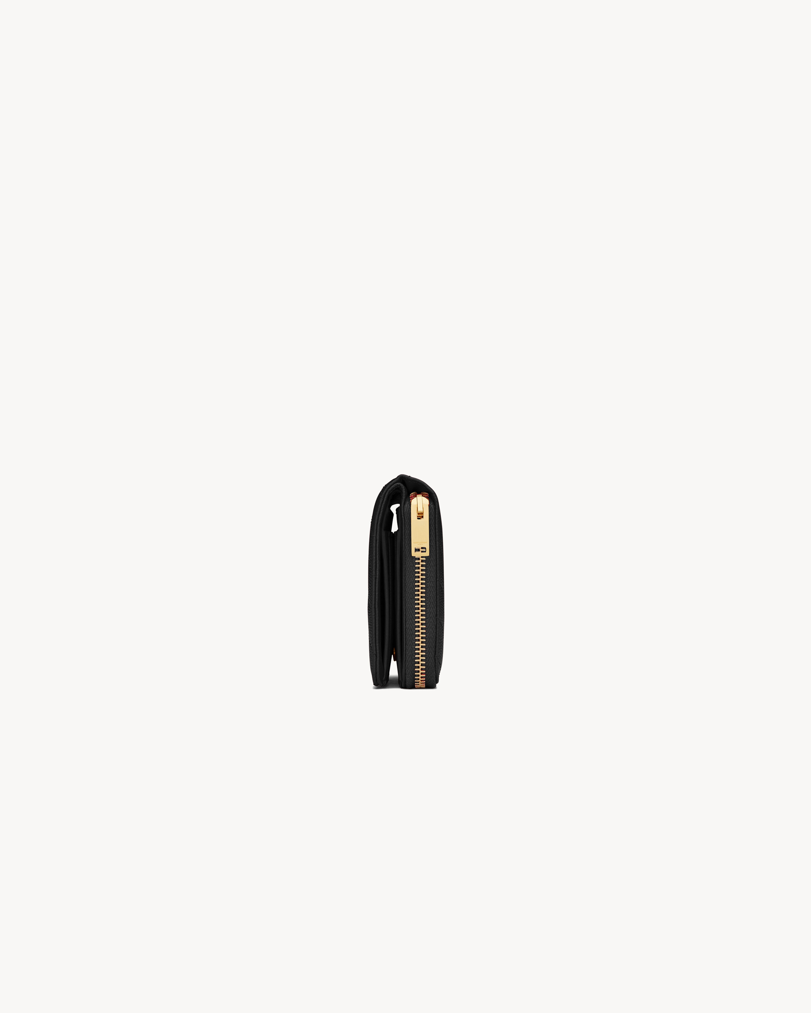 CASSANDRE MATELASSÉ compact zip around wallet in grain de poudre leather