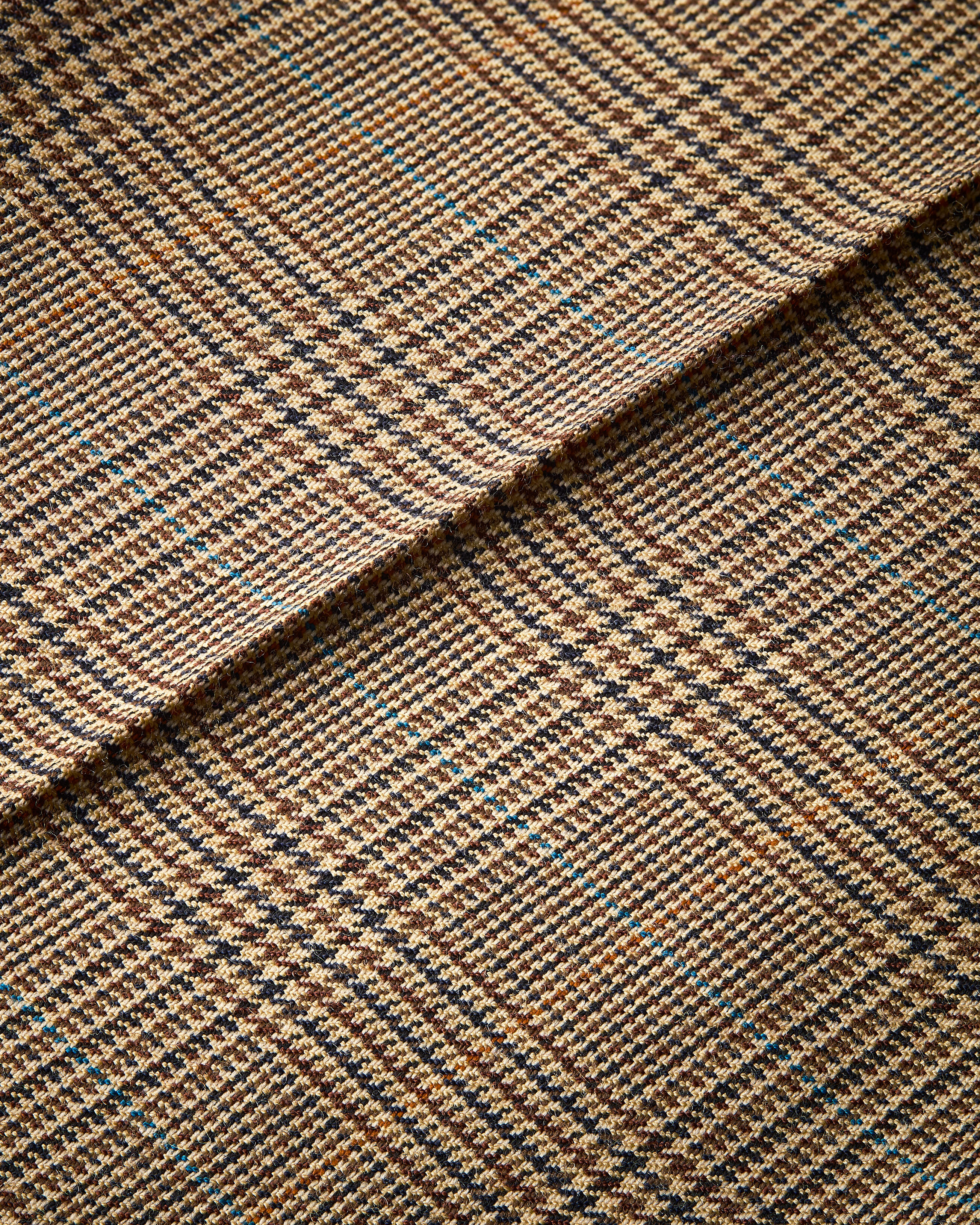 flared pants in puppytooth prince of wales wool