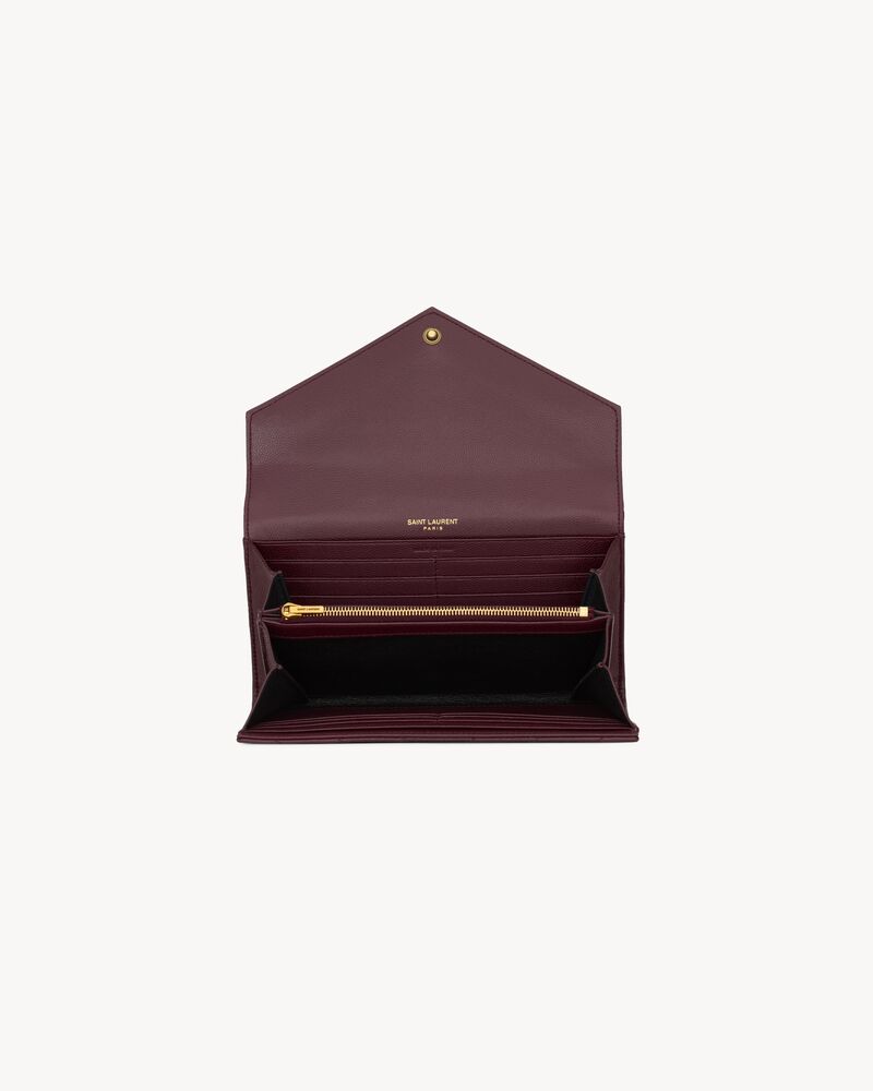 CASSANDRE large flap wallet in GRAIN DE POUDRE leather