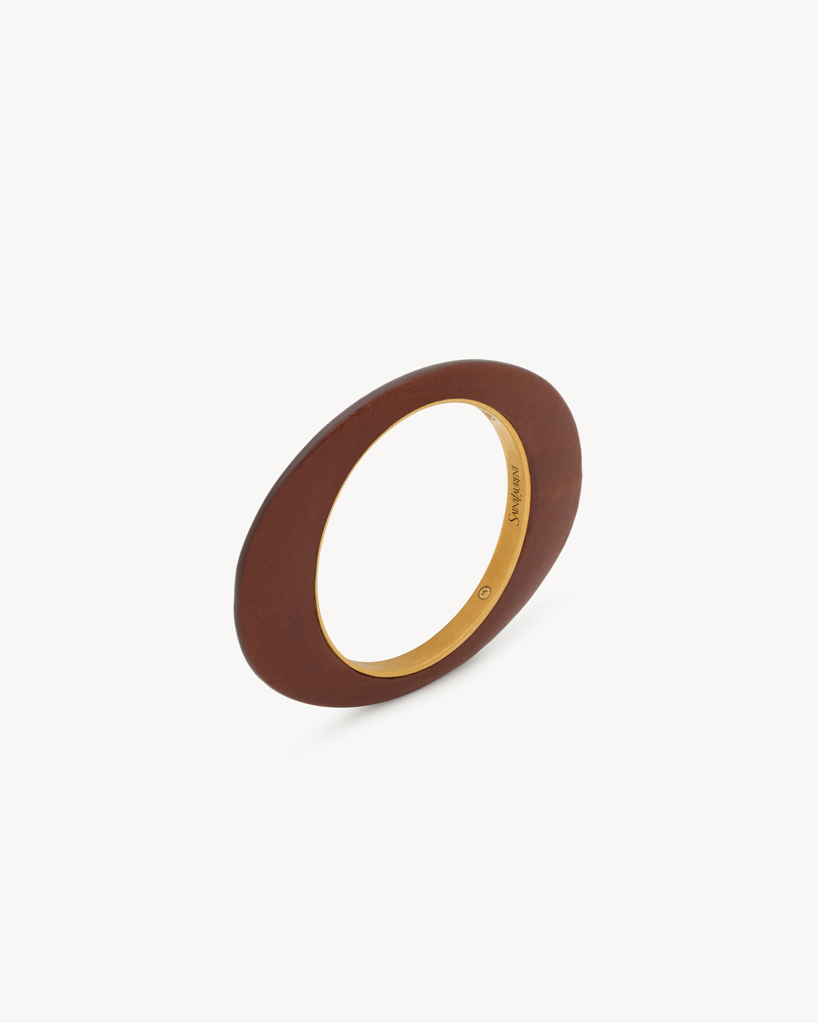 blade bangle in leather and metal