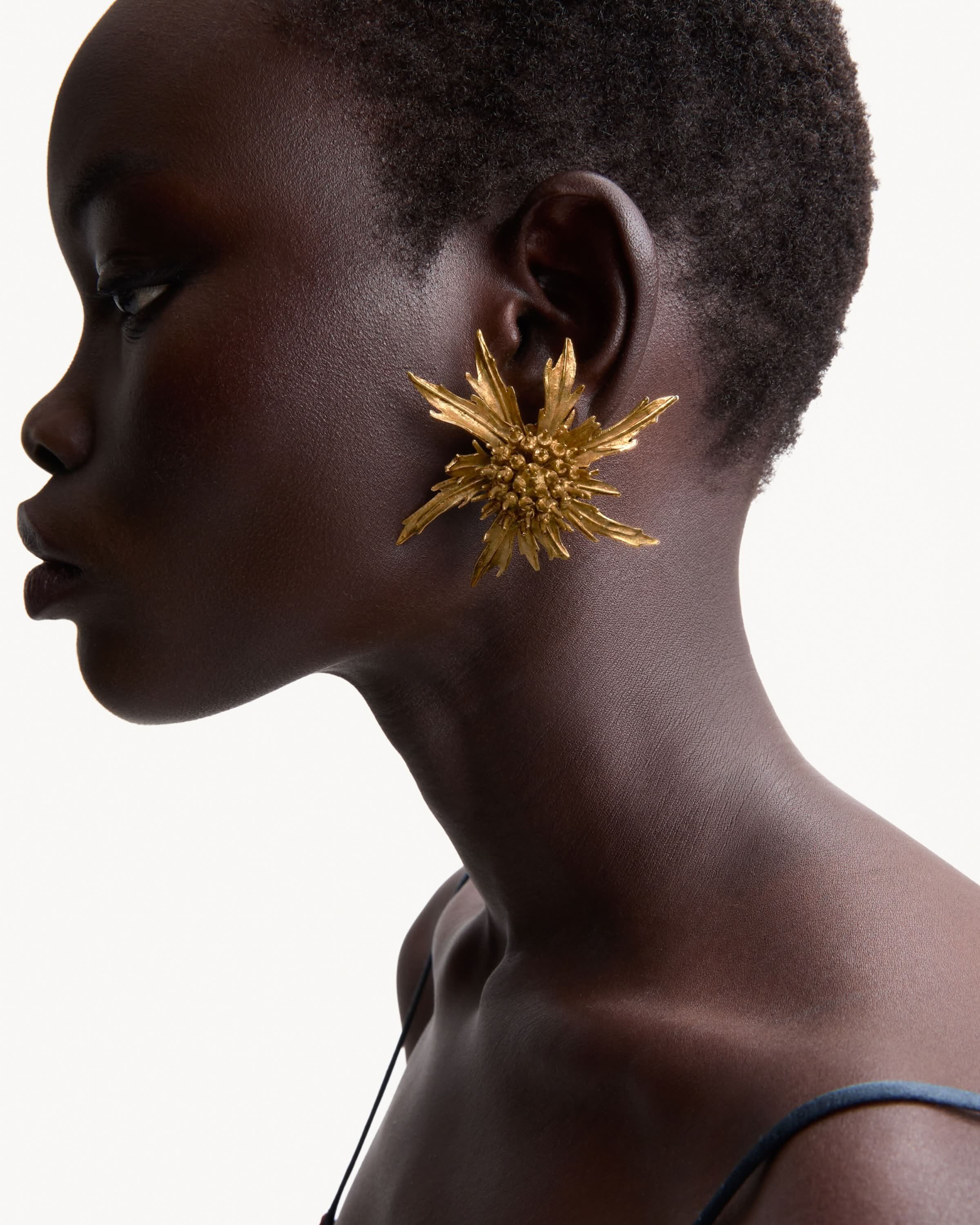 thistle earrings in metal