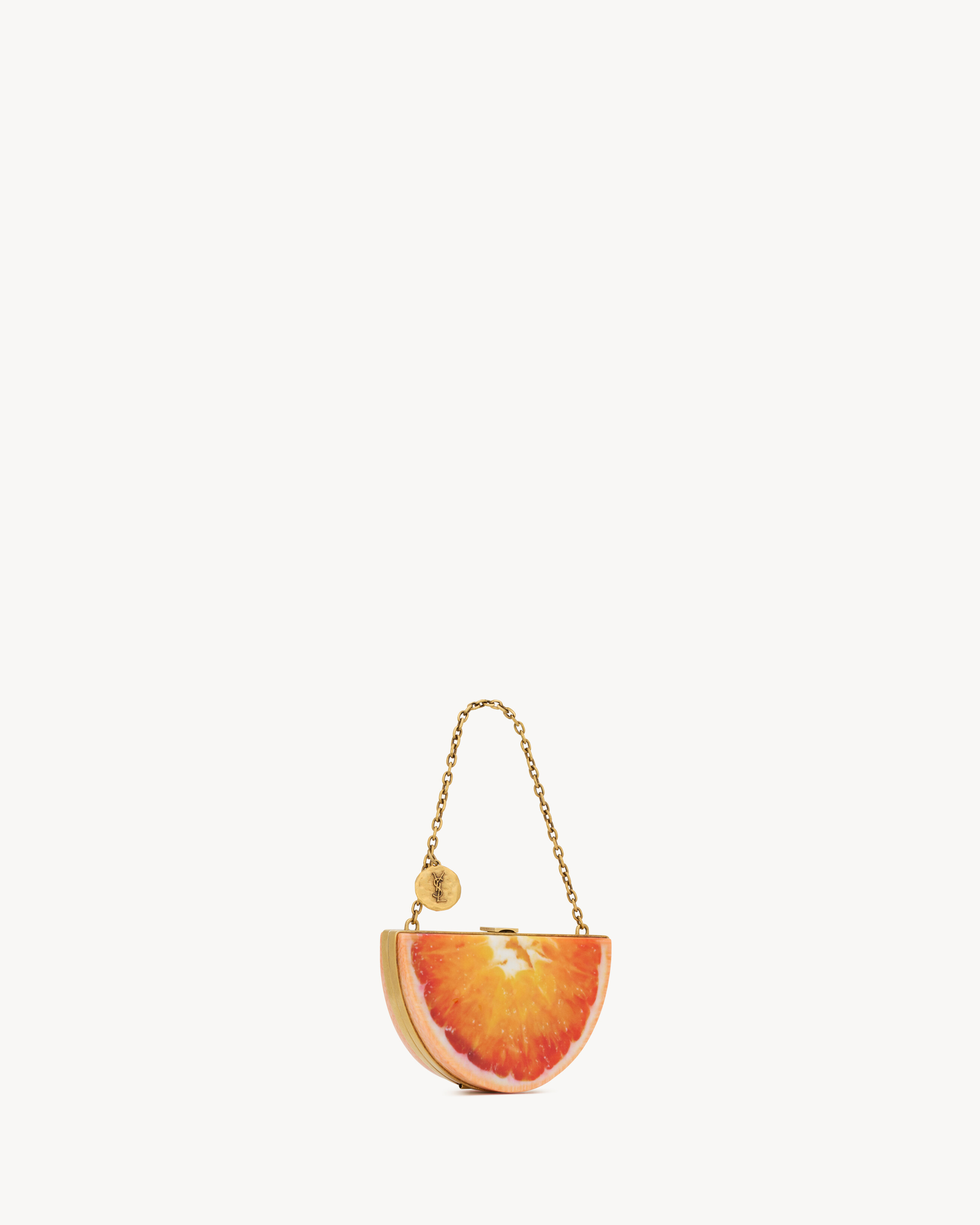 EVENING mini orange clutch in resin