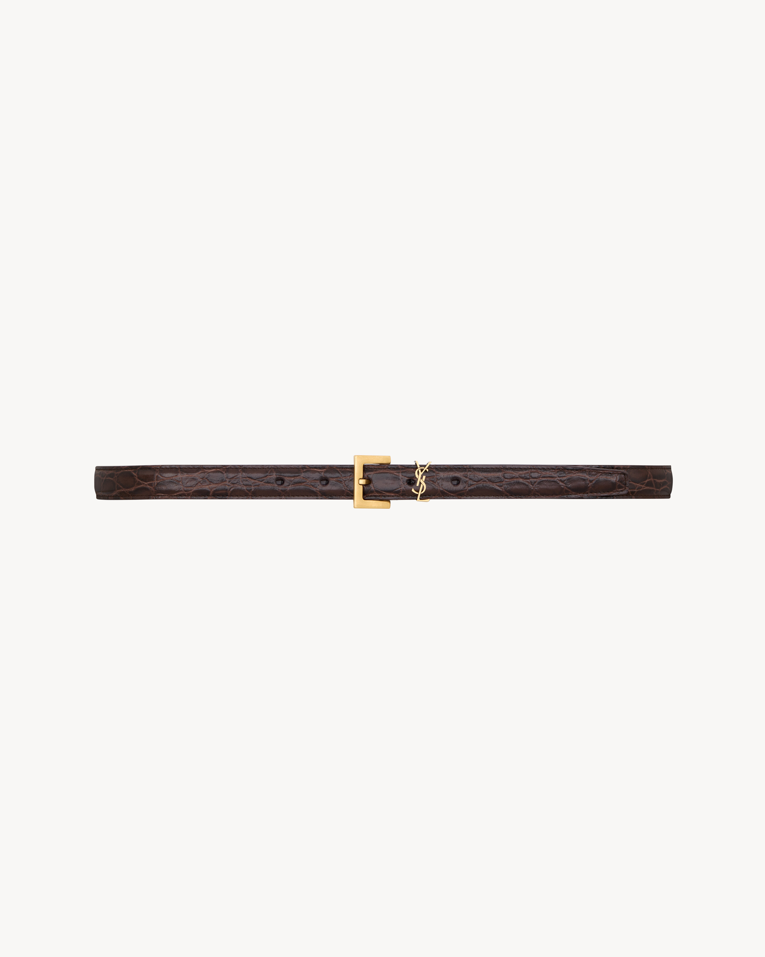 CASSANDRE thin belt in crocodile-embossed leather