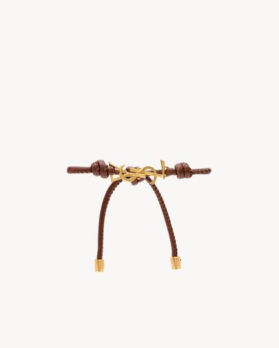 CASSANDRE cord bracelet in leather in Brown | Saint Laurent | YSL