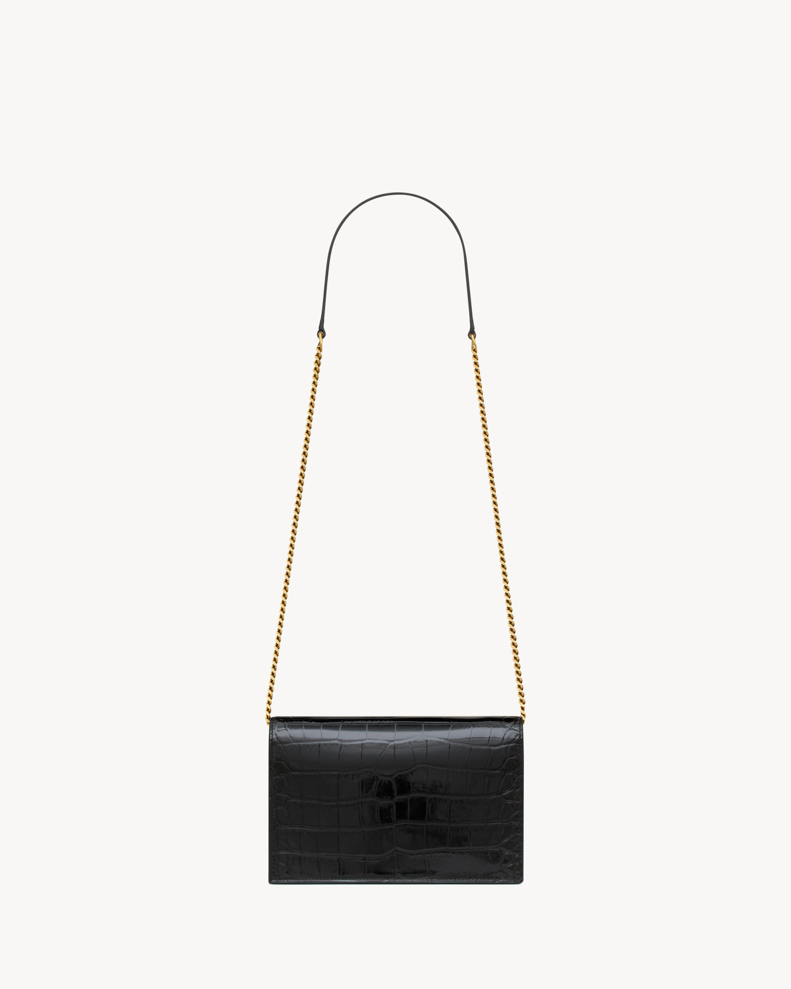 CASSANDRE envelope chain wallet in crocodile-embossed patent leather