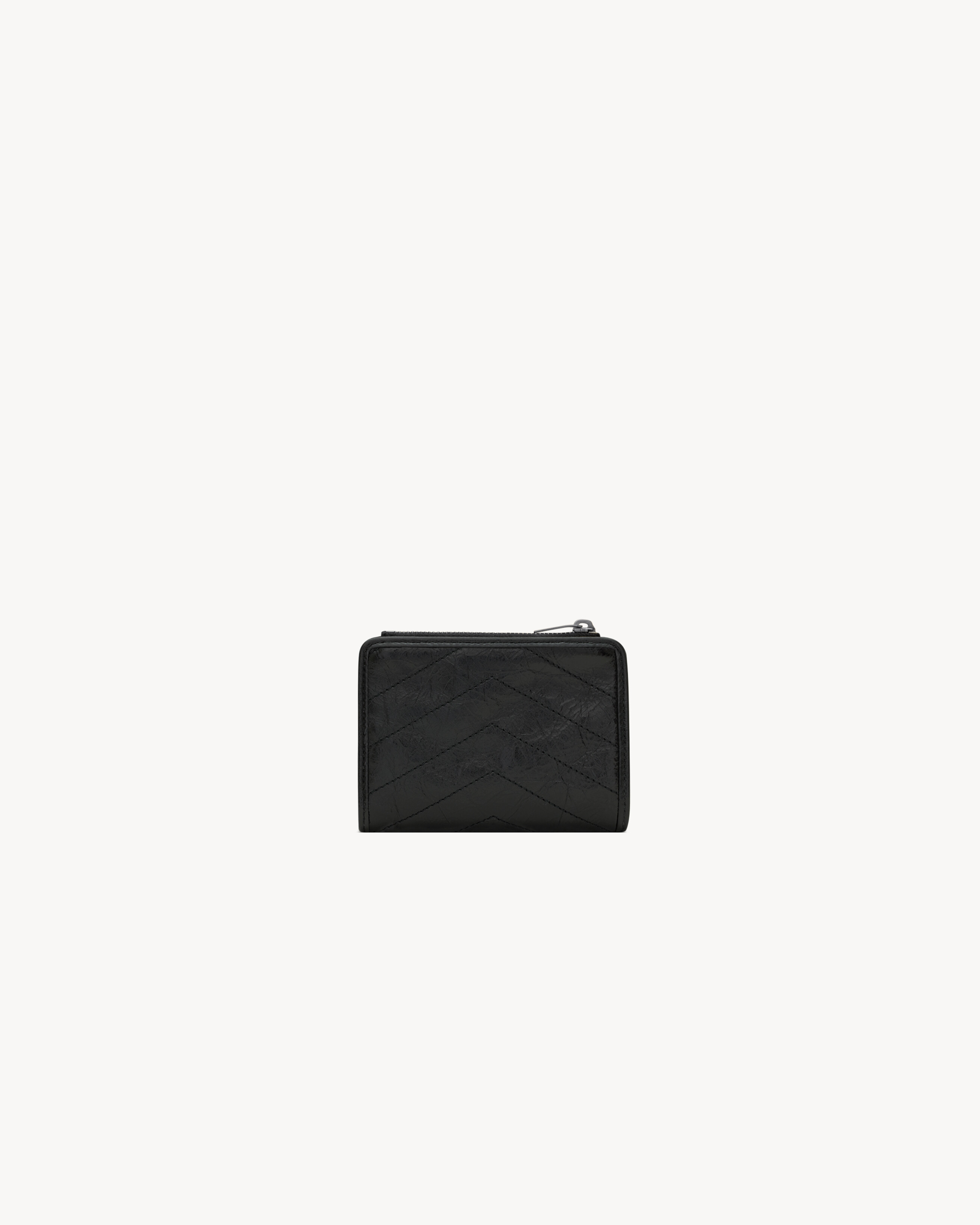 NIKI bi-fold wallet in vintage leather