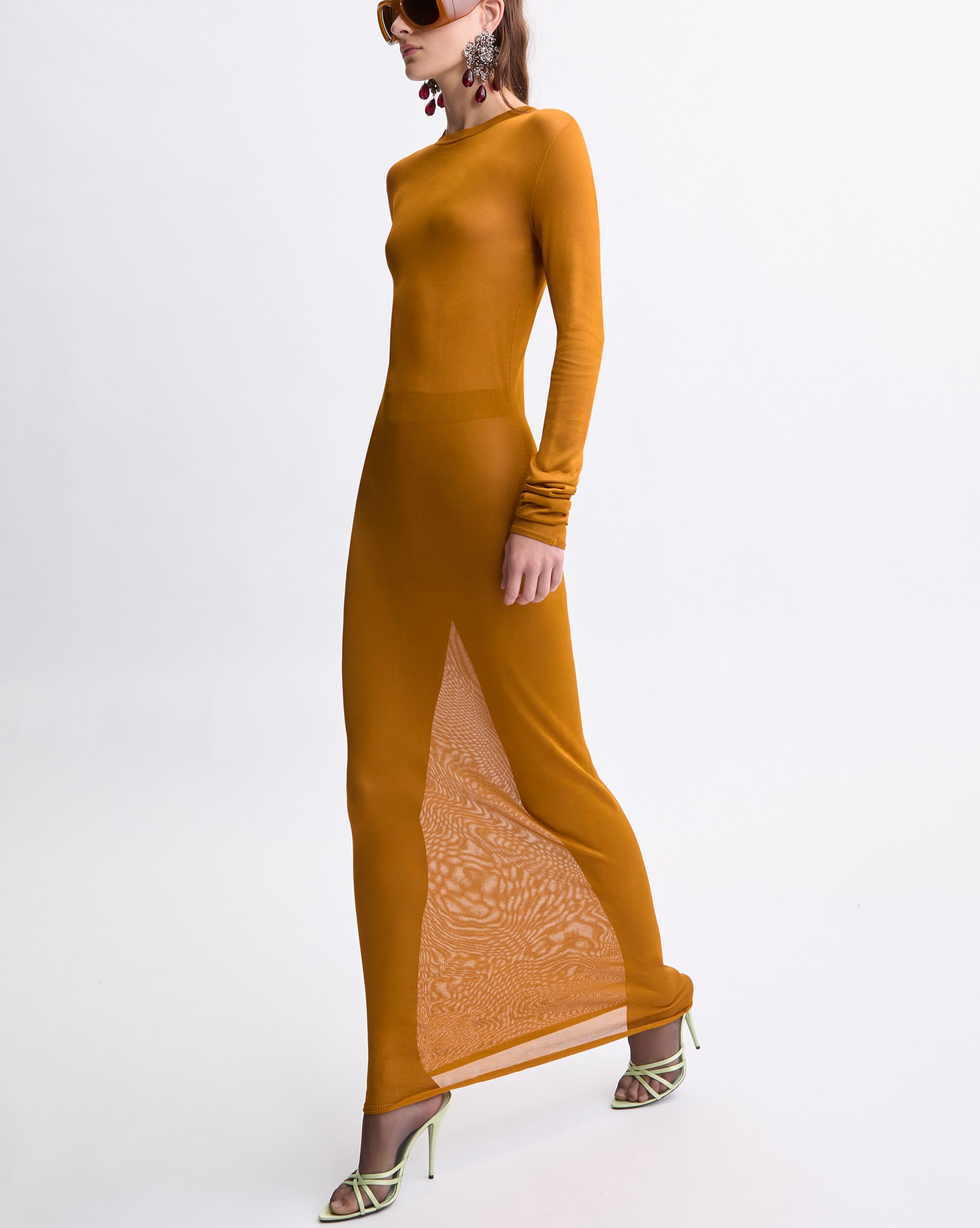 saint laurent orange dress Morgan Stewart in an Orange Saint Laurent V-Neck Dress for Nightly Pop The Nines