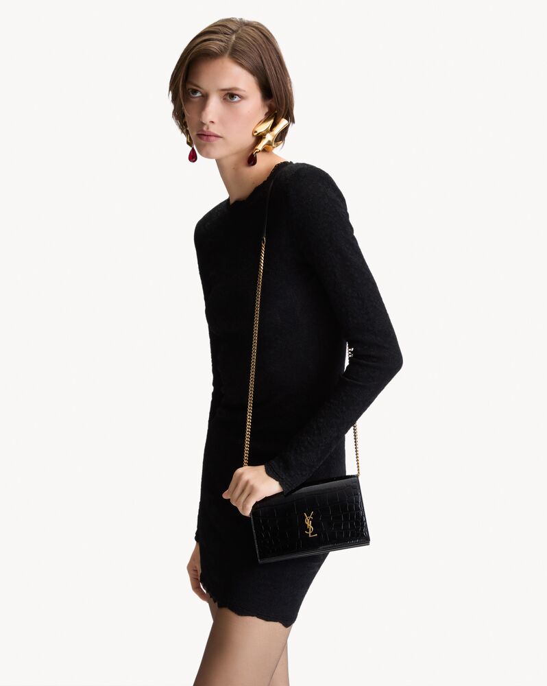 CASSANDRE envelope chain wallet in crocodile-embossed patent leather