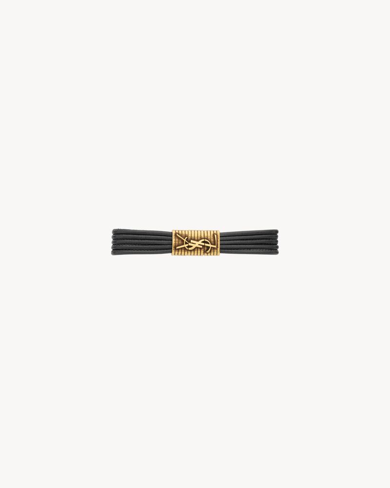 CASSANDRE cord bracelet in leather and metal