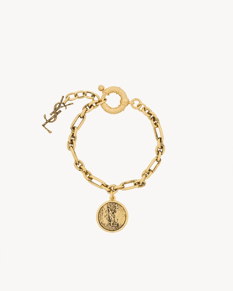 CASSANDRE medallion bracelet in metal