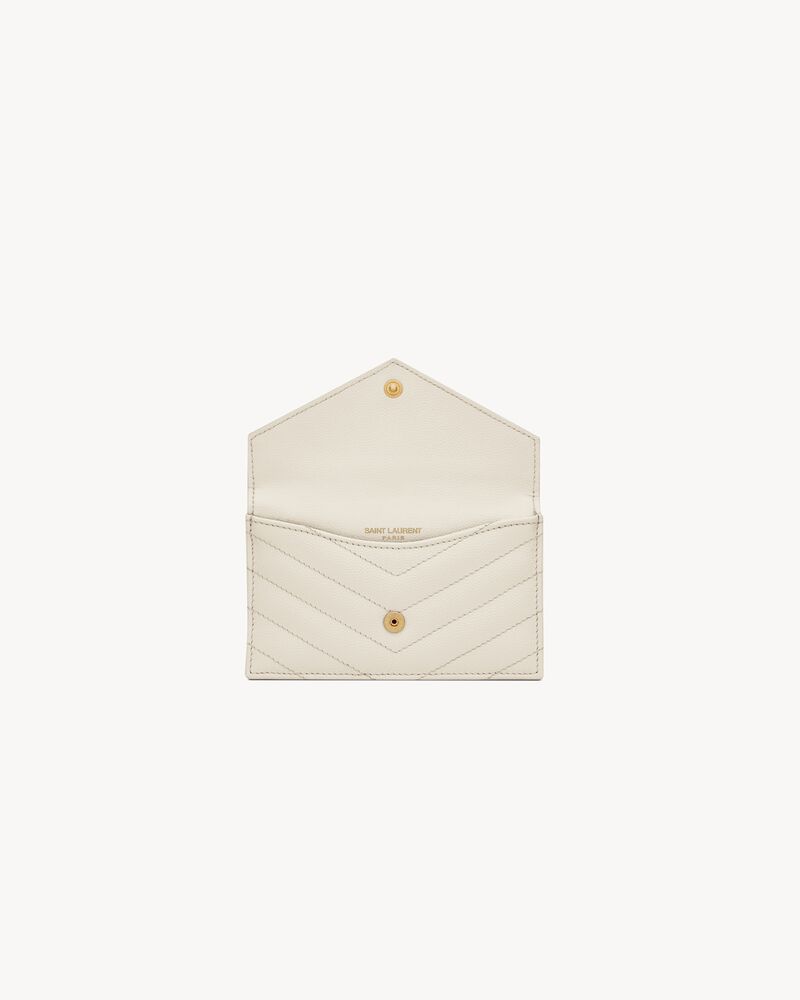 CASSANDRE MATELASSÉ FRAGMENTS FLAP CARD CASE IN GRAIN DE POUDRE LEATHER