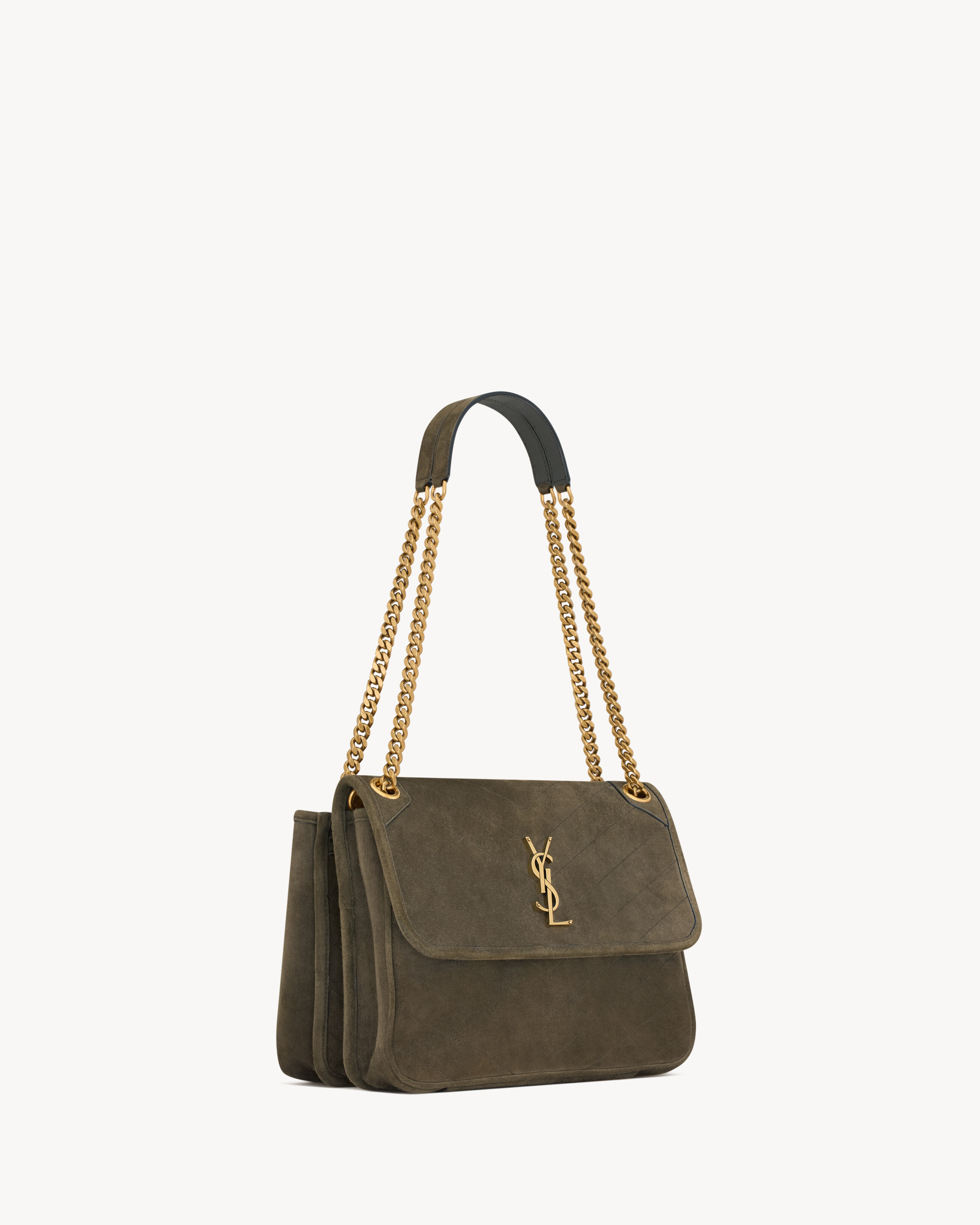 NIKI TRIPOUCH en suède