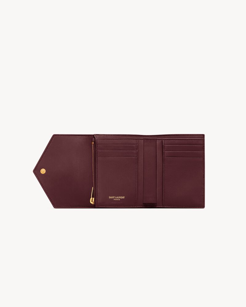 CASSANDRE compact tri fold wallet in lambskin