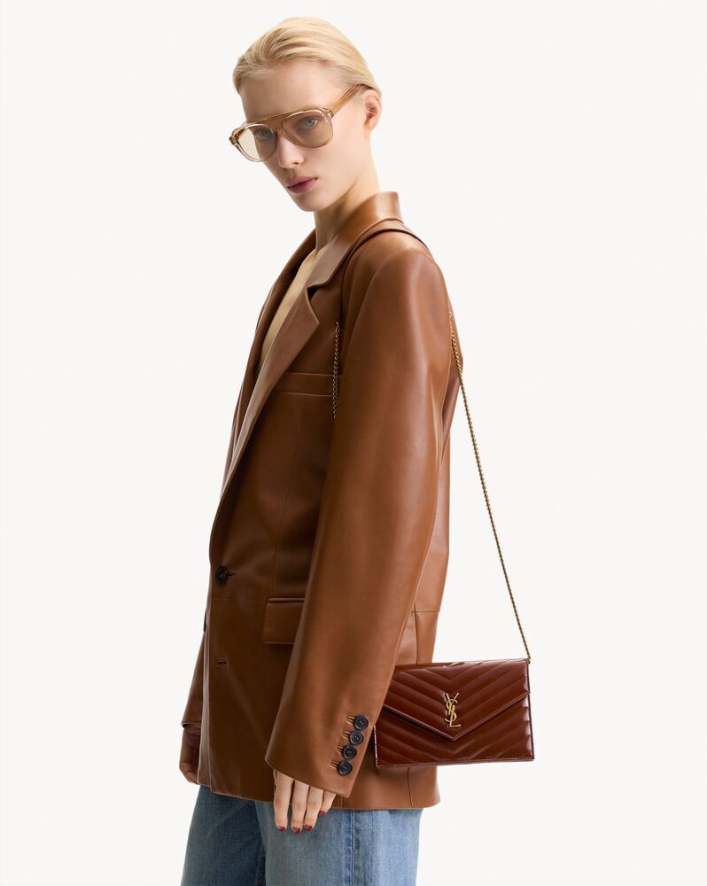 CASSANDRE envelope chain wallet in patent leather