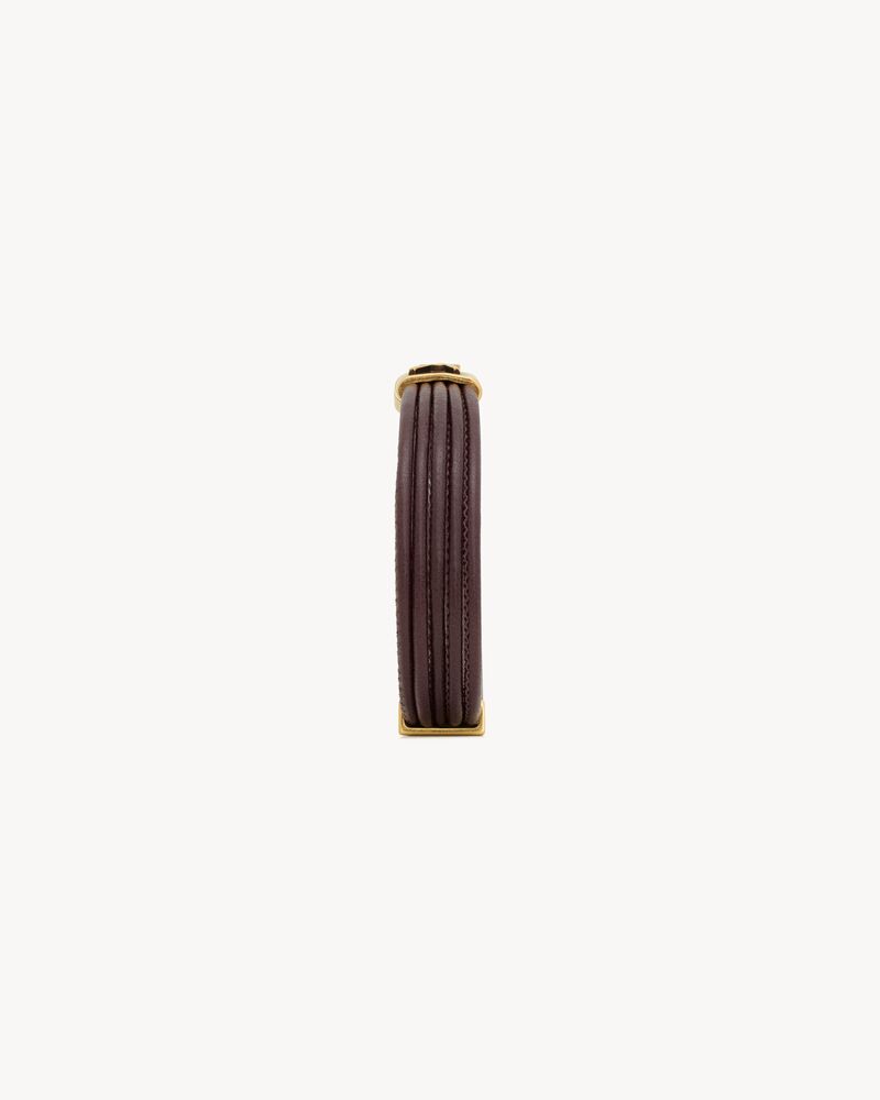 CASSANDRE cord bracelet in leather and metal