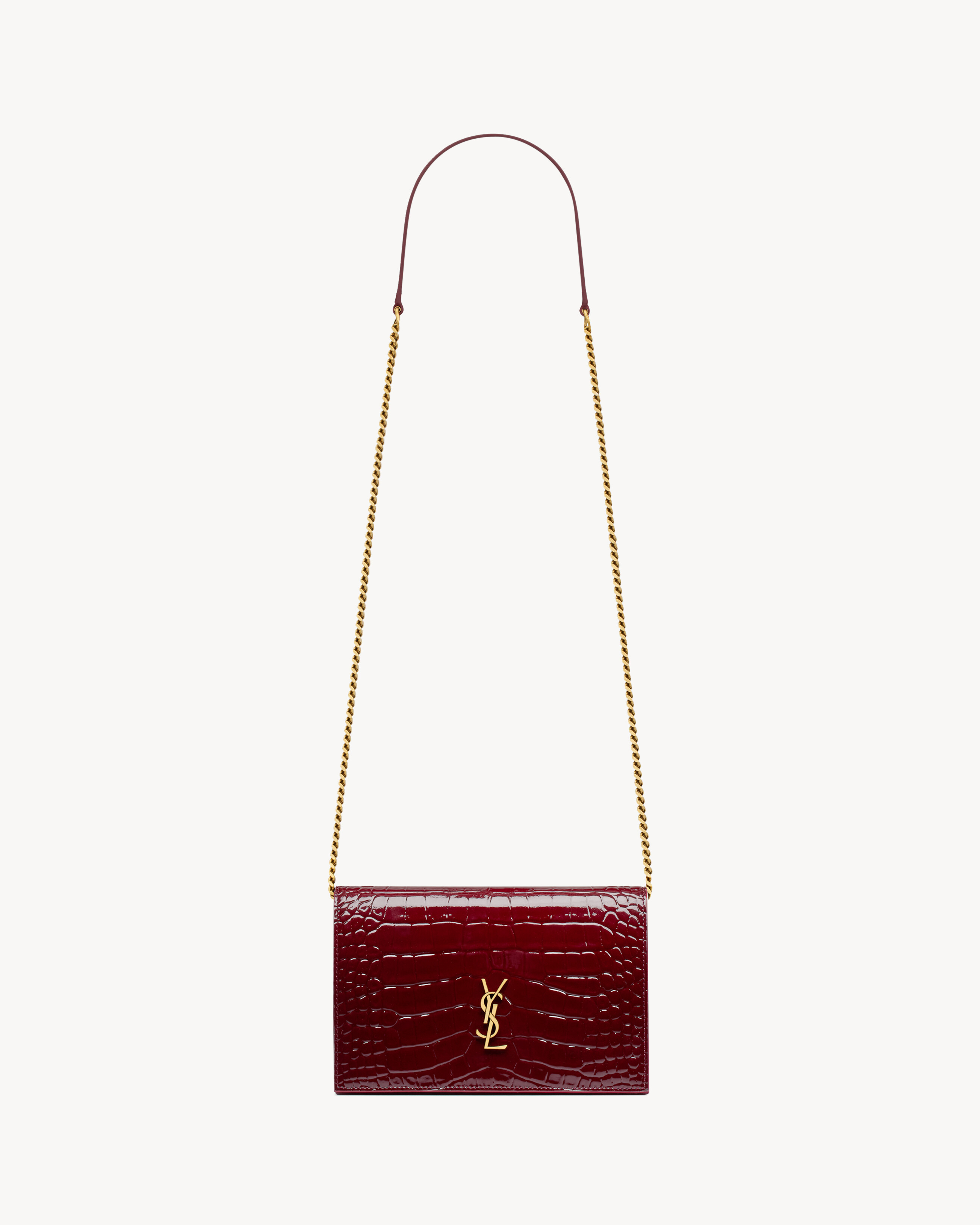 CASSANDRE envelope chain wallet in crocodile-embossed patent leather