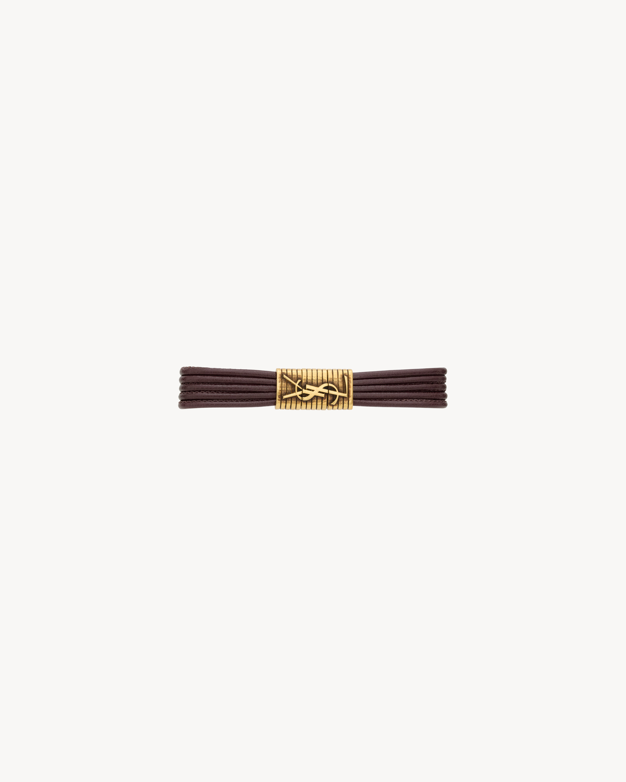 CASSANDRE cord bracelet in leather and metal