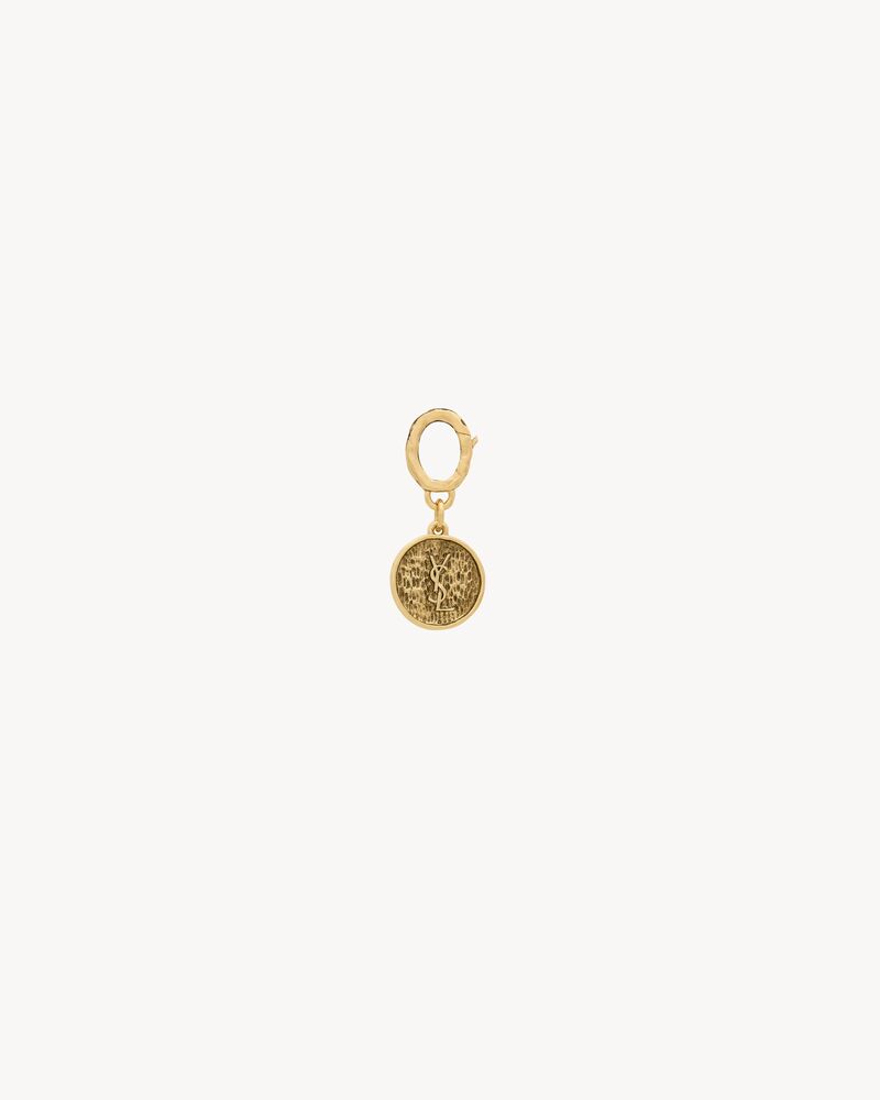 CASSANDRE charm in metal
