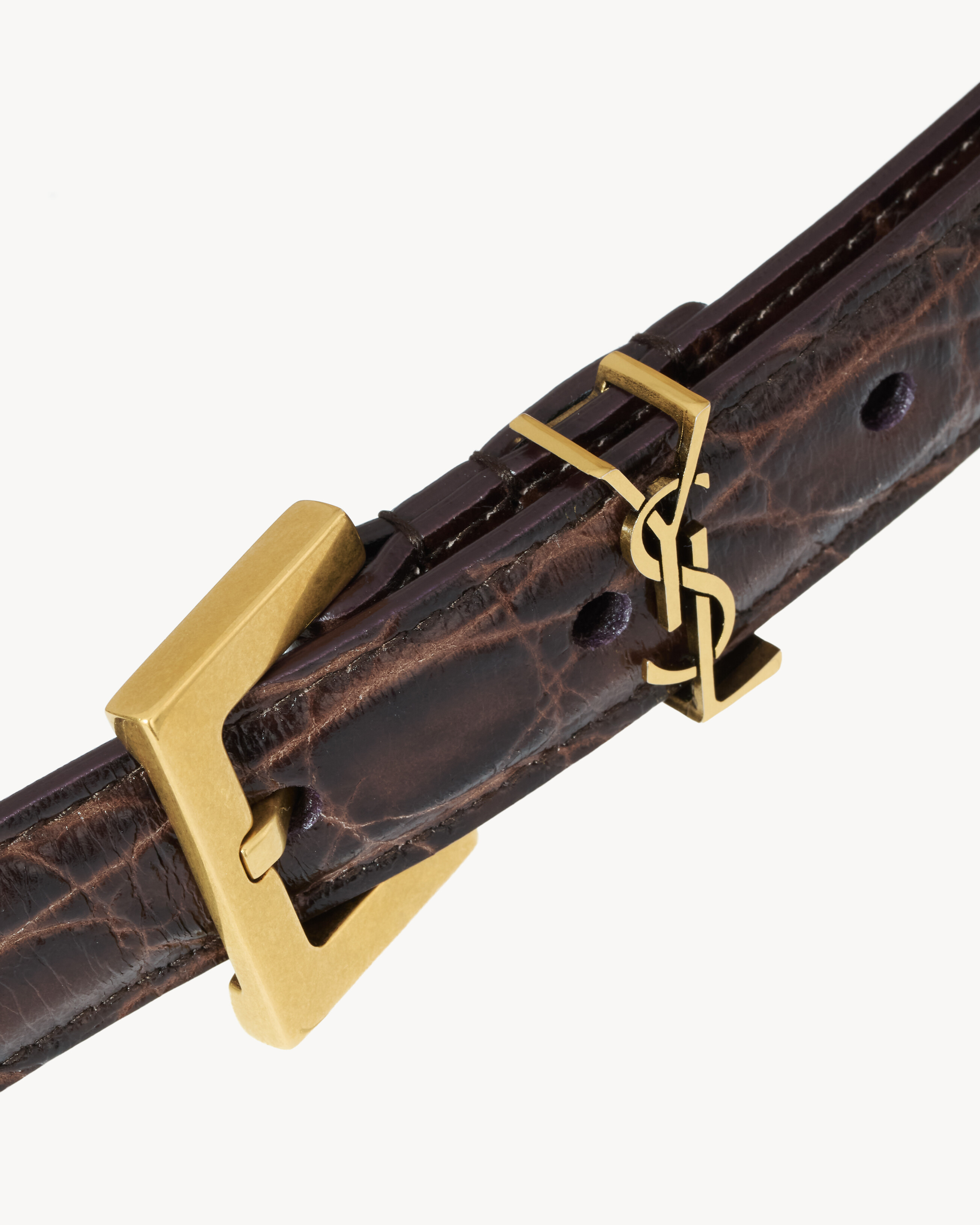 CASSANDRE thin belt in crocodile-embossed leather