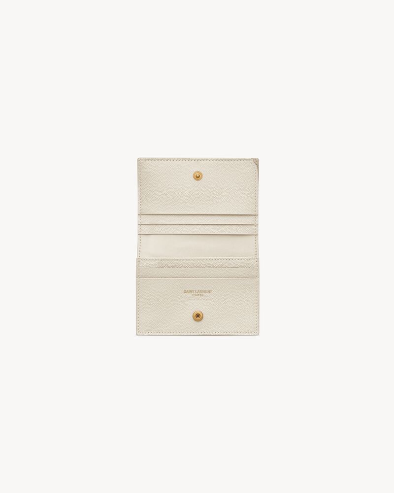 CASSANDRE MATELASSÉ FLAP CARD CASE IN GRAIN DE POUDRE LEATHER