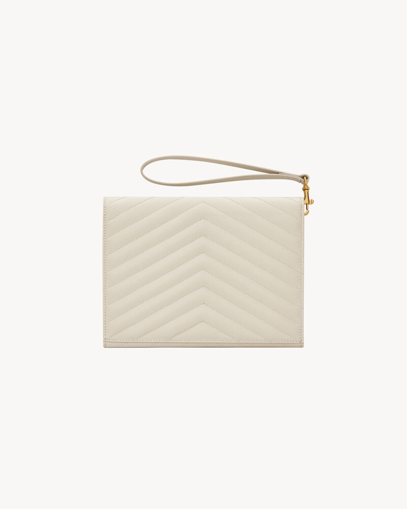 CASSANDRE Cartera de mano de piel acolchada y repujada grain de poudre