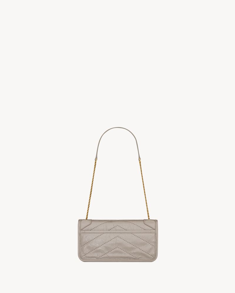 NIKI chain pouch in vintage leather
