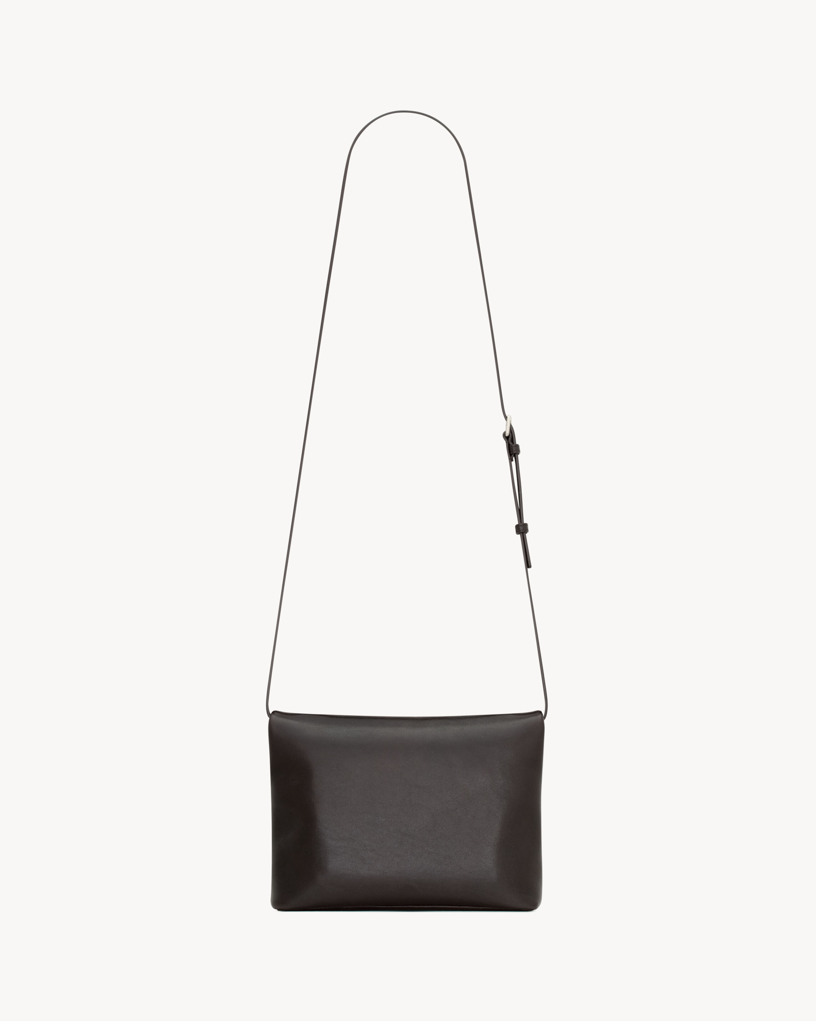 CASSANDRE envelope messenger in leather
