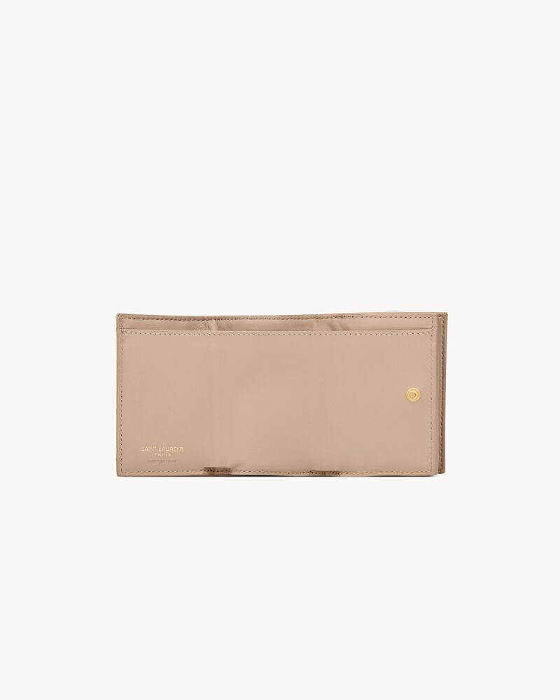 Tiny origami wallet in quilted grained leather