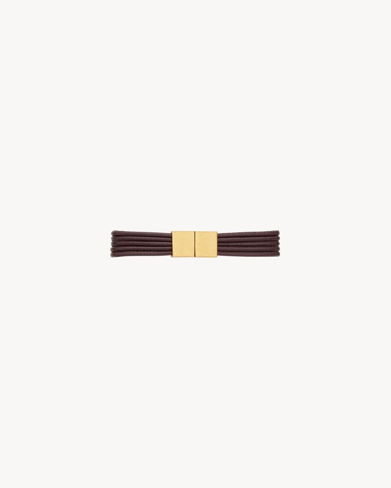 CASSANDRE cord bracelet in leather and metal